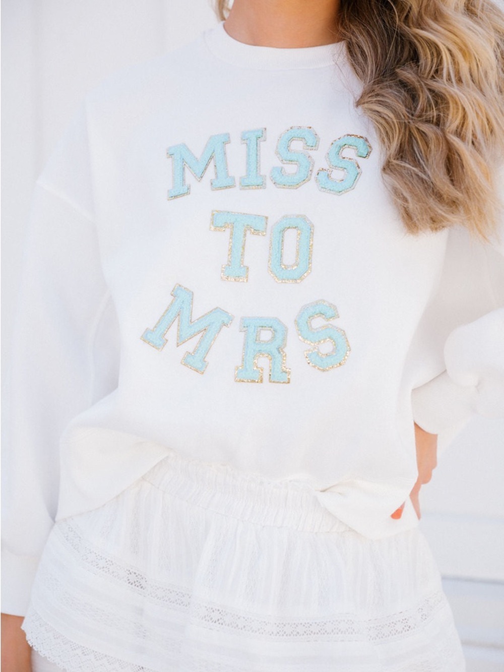 Judith March Miss to Mrs white pullover  blue lettering gold trim long sleeve